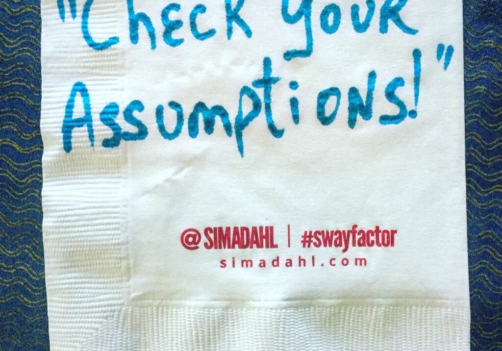 Check your assumptions! cocktail napkin quote
